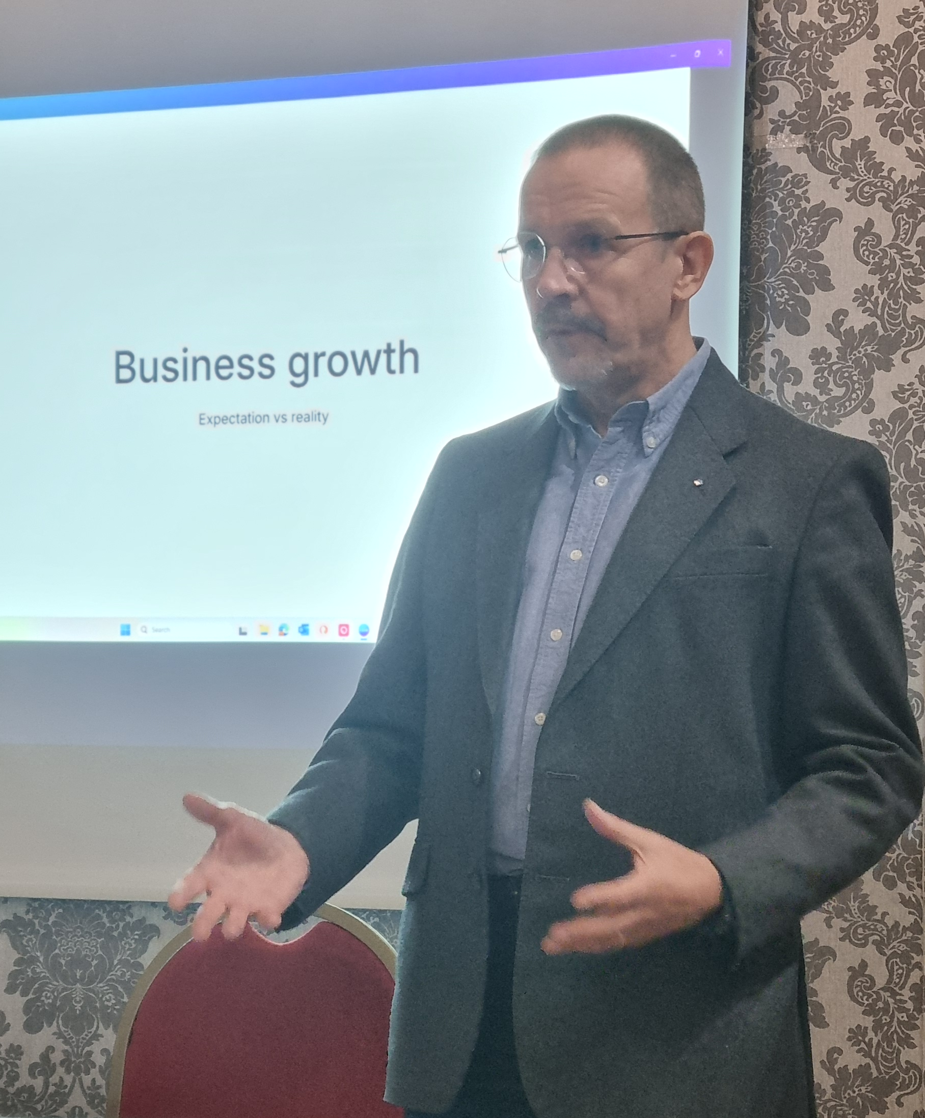 Jonathan Cozens speaking at a business event